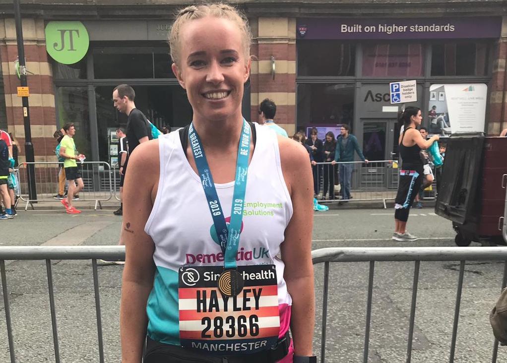 a girl who has just ran a marathon