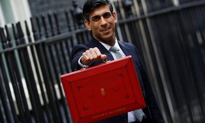 0 Britains Chancellor Of The Exchequer Rishi Sunak Holds The Budget Box Outside His Office In Downing