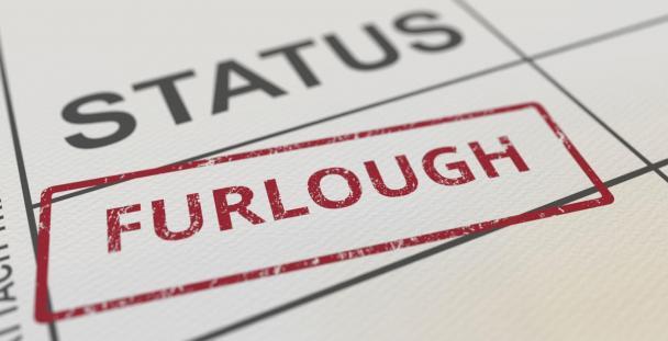 Status Furlough Stamp (C) Novikov Aleksey Shutterstock 1702380772